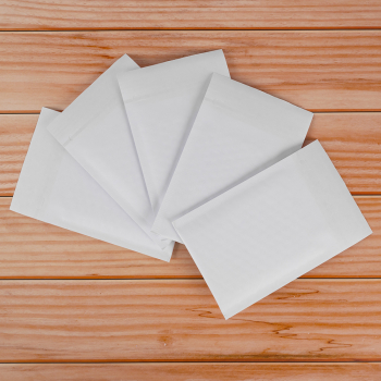 Белый крафт пакет с прослойкой и стрип-лентой, 13*17 см, А/000