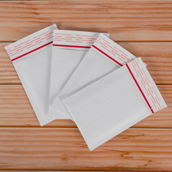 Белый крафт пакет с прослойкой и стрип-лентой, 13*17 см, А/000