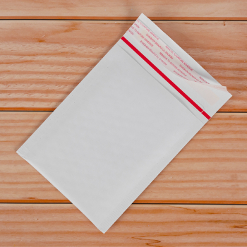 Белый крафт пакет с прослойкой и стрип-лентой, 13*17 см, А/000